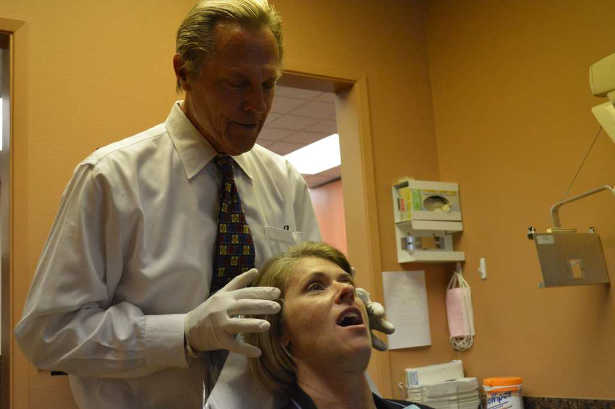 Dr. Peterson examining a TMJ patient